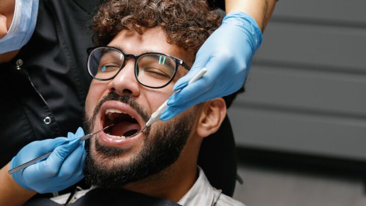 Dental examination highlighting the importance of detecting early warning signs of gum disease.