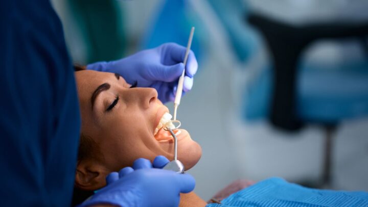 Patient receiving cosmetic dental treatment for natural-looking results.